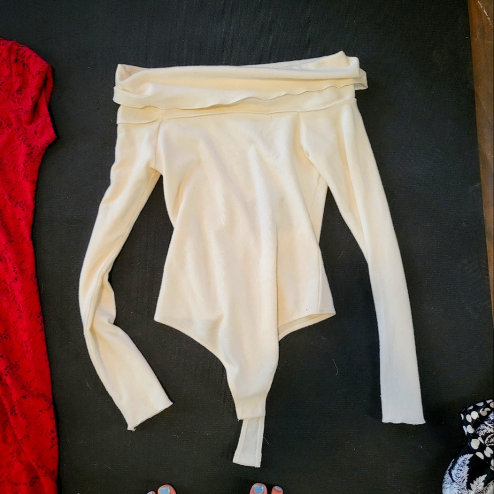 Long sleeve cream colored off shoulder leotard sweater